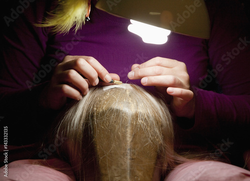 Fototapeta Professional Wig Maker Working in her Workshop.