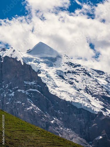 Icy top of the mountain with glacier in the summer, Swiss Alps
