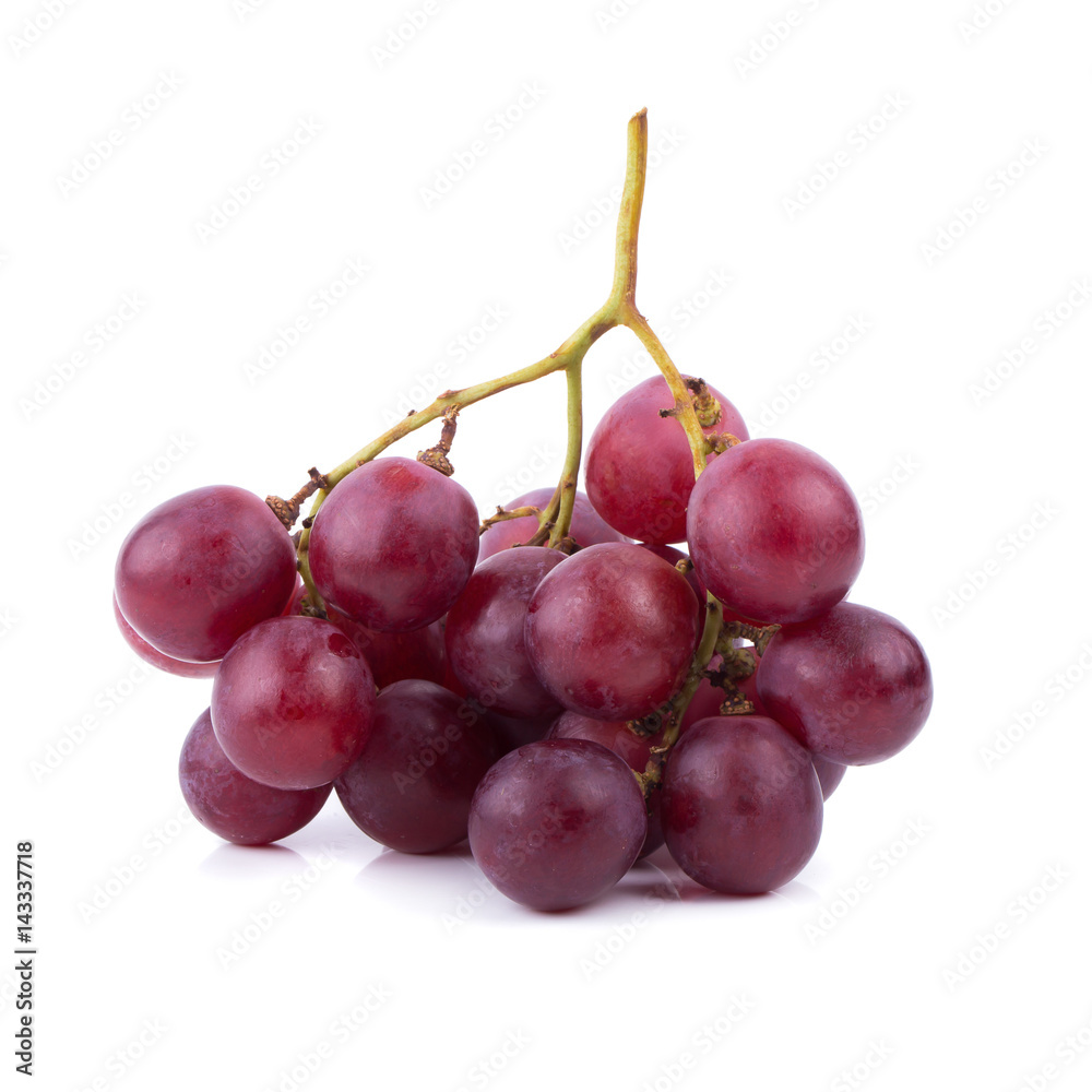 Bunches of fresh ripe red grapes on a white background