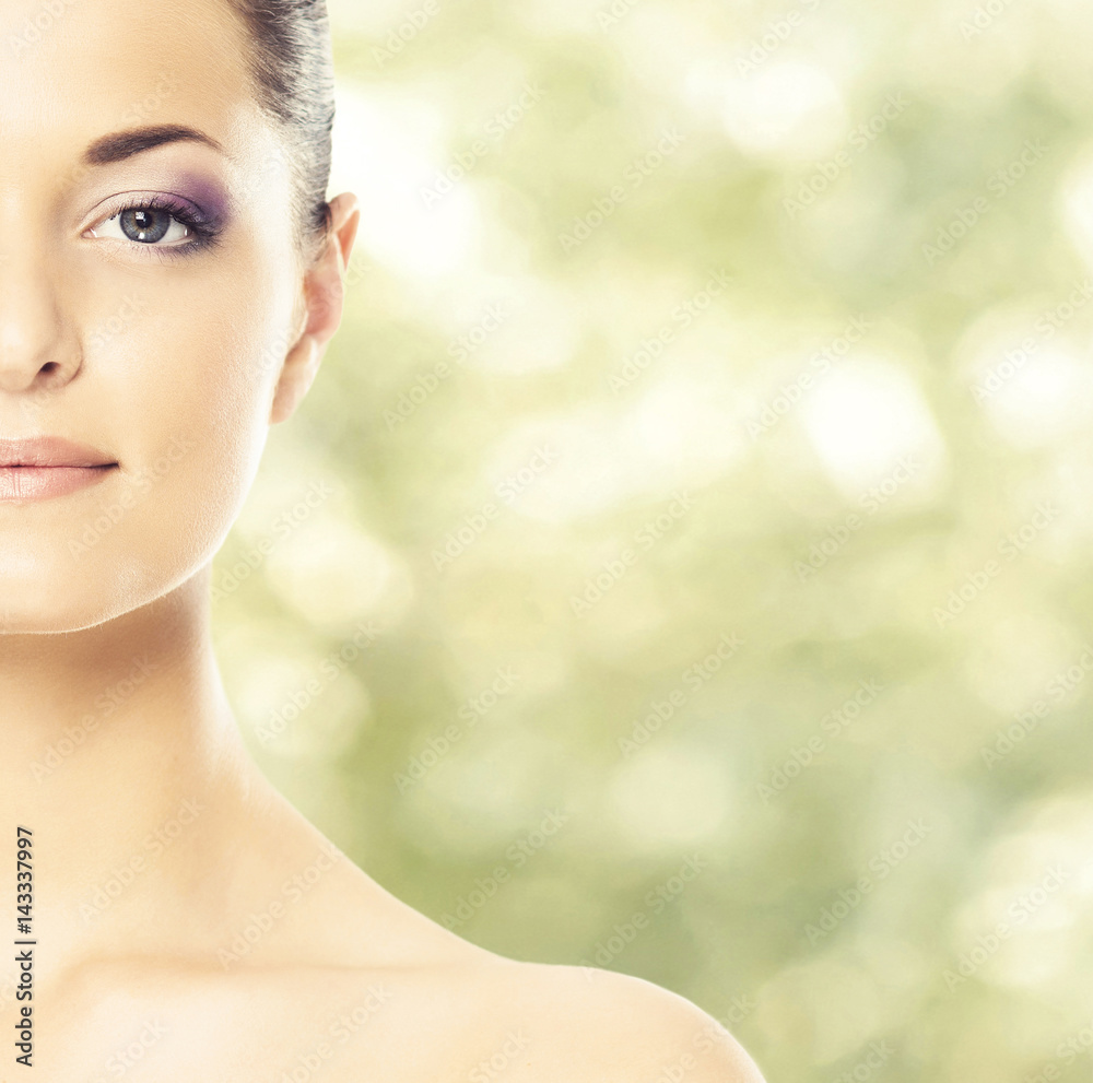 Portrait of young, beautiful and healthy woman: over spring and summer background. Healthcare, spa, makeup and face lifting concept. Portrait of young, beautiful and healthy woman: over spring and summer background. Healthcare, spa, makeup and face lifting concept.