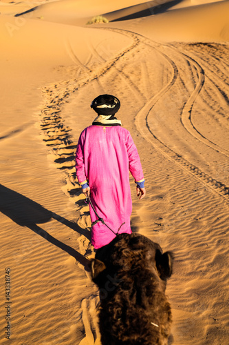 guide of a camel trip in the Sahara desert