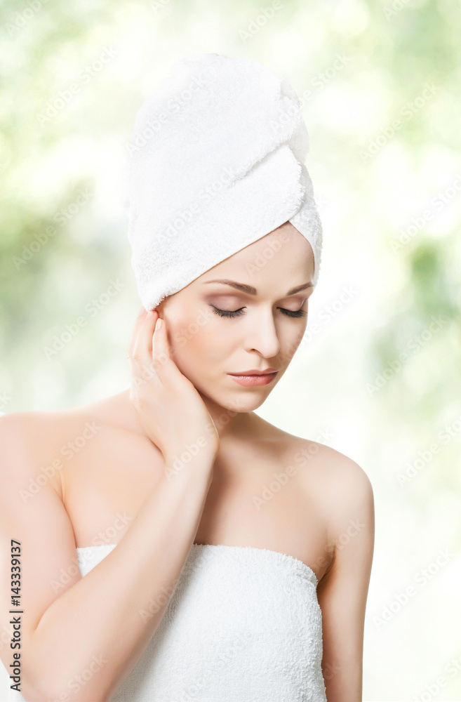 Close-up portrait of beautiful, fresh, healthy and sensual girl with bath towel on her head. Health, treatment, spa concept. Close-up portrait of beautiful, fresh, healthy and sensual girl with bath towel on her head. Health, treatment, spa concept.