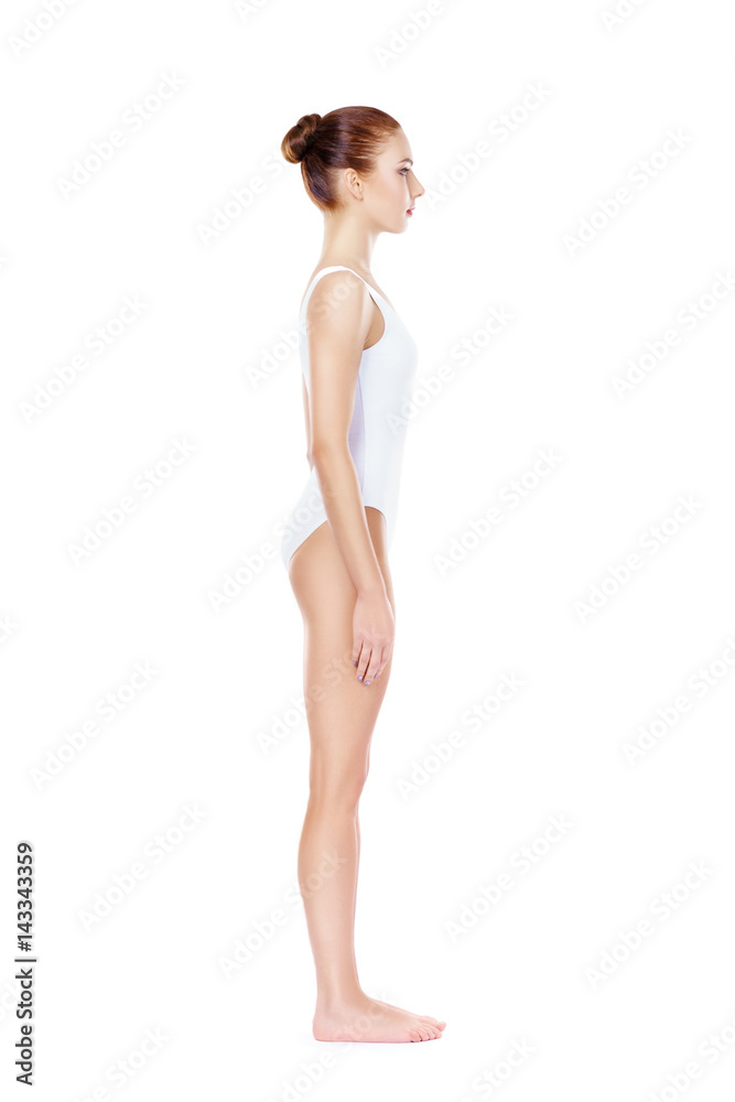 Fototapeta premium Fit and sporty girl in white underwear. Beautiful and healthy woman posing over isolated white background. Sport, fitness, diet, weight loss and healthcare concept.