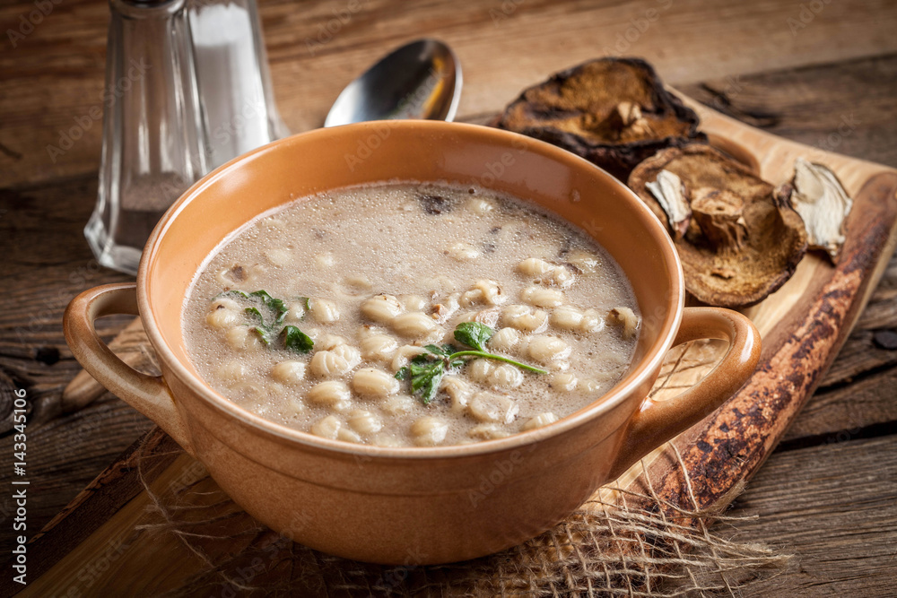 Mushroom soup on a wooden table. Mushroom soup on a wooden table.