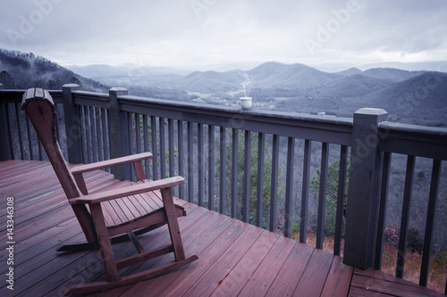 Terrace with chair  cup of coffee and mountain view