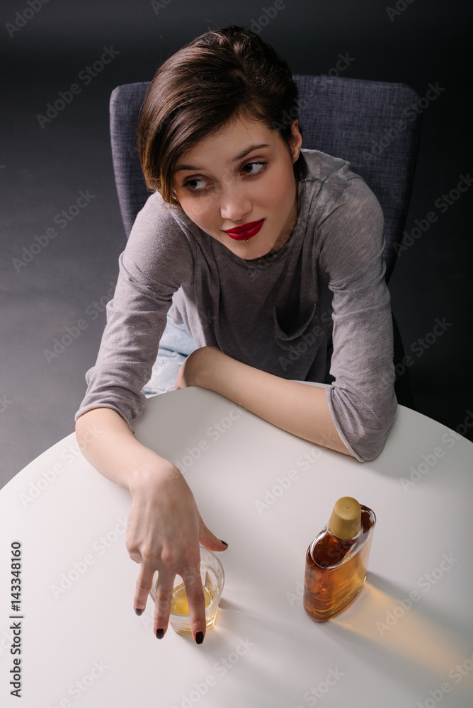 Starting to drink alone StockFoto Adobe Stock