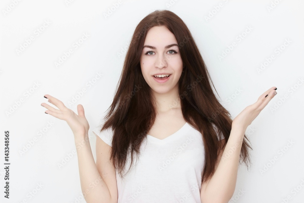 Young casual woman In pink blouse isolated over white background studio portrait Young casual woman In pink blouse isolated over white background studio portrait