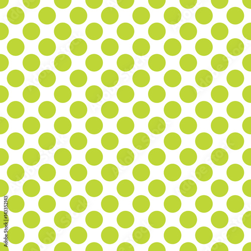 Seamless lime green polka dots pattern texture background
