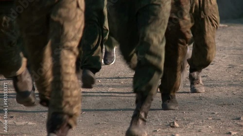 Soldiers training runs on the road. The boots only.