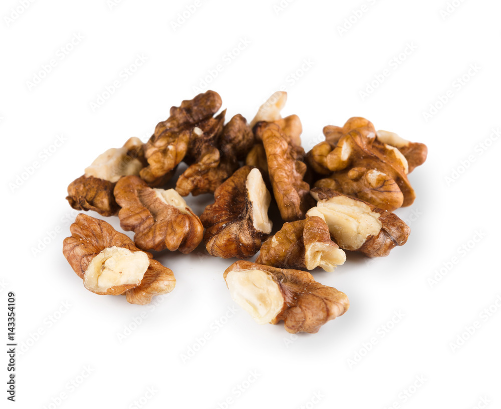 Pile of peeled walnuts close-up isolated on white background Pile of peeled walnuts close-up isolated on white background