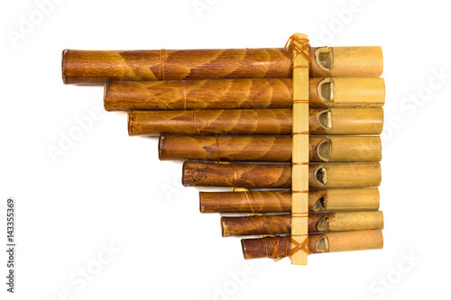 Handmade pan flute isolated on white background