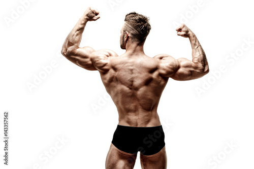 Photos muscular super-high level handsome man posing on white background