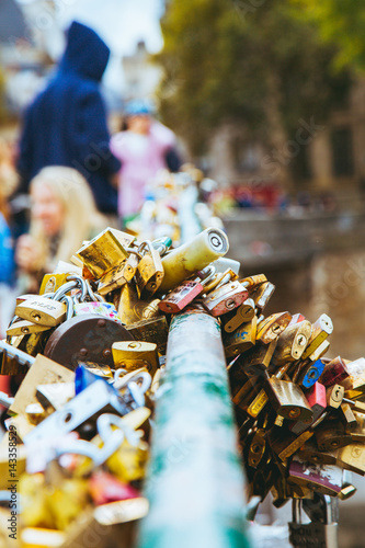 Beautiful love locks in Paris on the brodge by the Notre Dame. photo