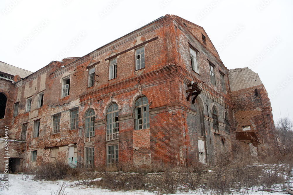 Abandoned sugar factory of red brick 