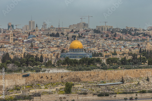 Panoramic view of Jerusalem Old city and the Temple Mount, Dome of the Rock and Al Aqsa Mosque from the Mount of Olives in Jerusalem, Israel.