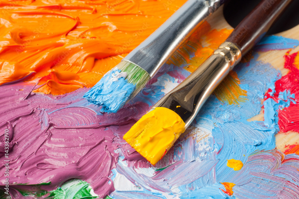 Fototapeta premium Colored paint on the artist's palette