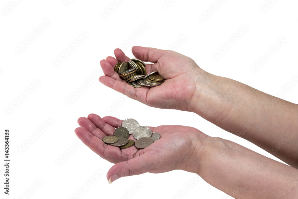 A handful of coins in the hands of an elderly woman A handful of coins in the hands of an elderly woman