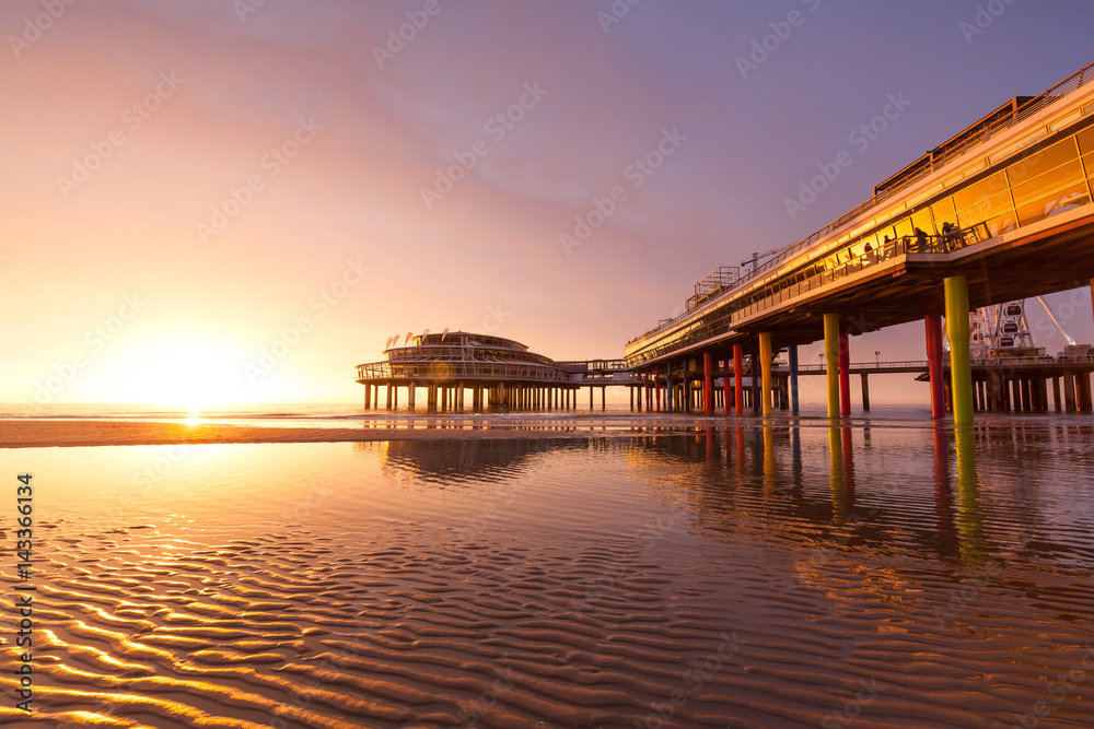 Lovely Sunset at Pier in Schevenigen, seaside resort near Den Haag