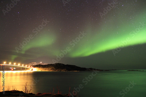 Northern lights reflected in seawater. Tromso, Norway. © Guilherme