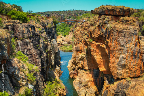 Bridge over the canyon at the Bourke's Luck potholes in the Blyde river, Mpumalanga, South Africa photo