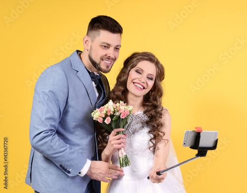 Happy wedding couple making...