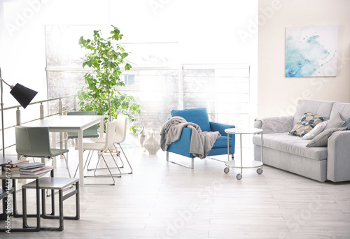 Modern interior of cozy living room © Africa Studio