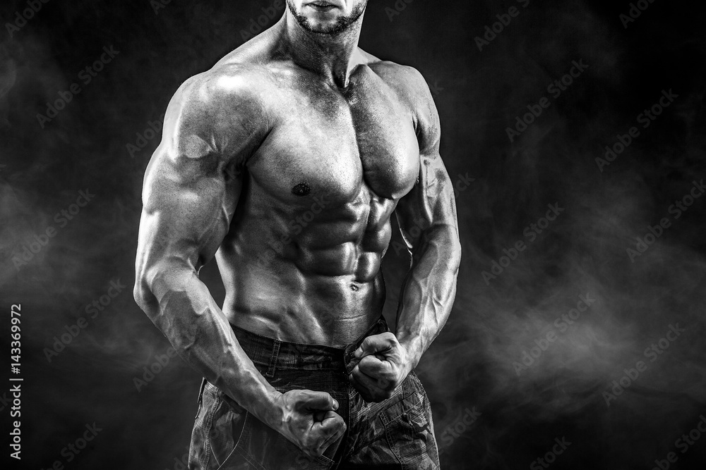 Strong bodybuilder with six pack. Man with perfect abs, shoulders ...