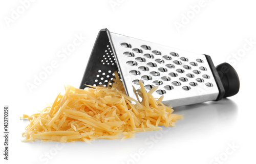 Quadro em tela Metal grater and pile of cheese isolated on white