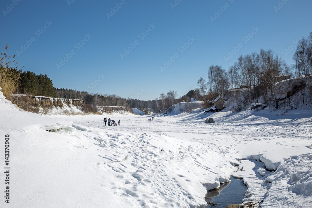 Winter landscape on the river. Siberia, Russia