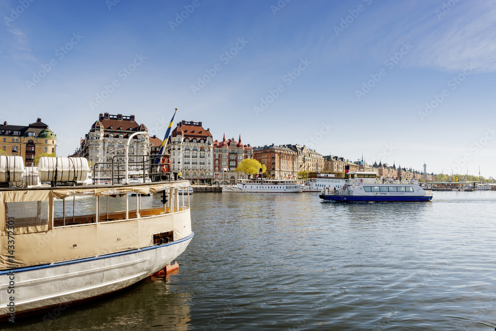 Sweden, Stockholm, Nybroviken, Tourboat leaving harbor Sweden, Stockholm, Nybroviken, Tourboat leaving harbor