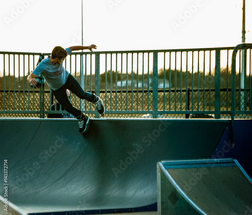 Obraz na płótnie Boy Rollerblading at Skate Park