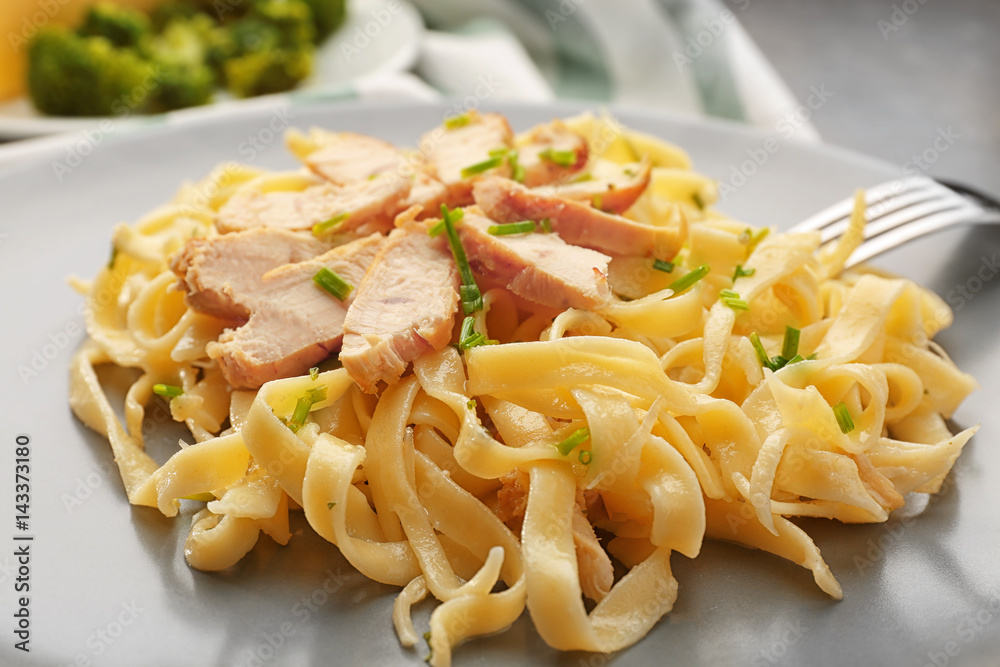 Plate with delicious Chicken Alfredo, closeup