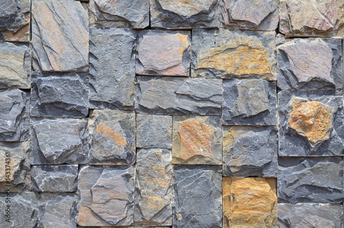 Bricks are constructing the wall in the garden