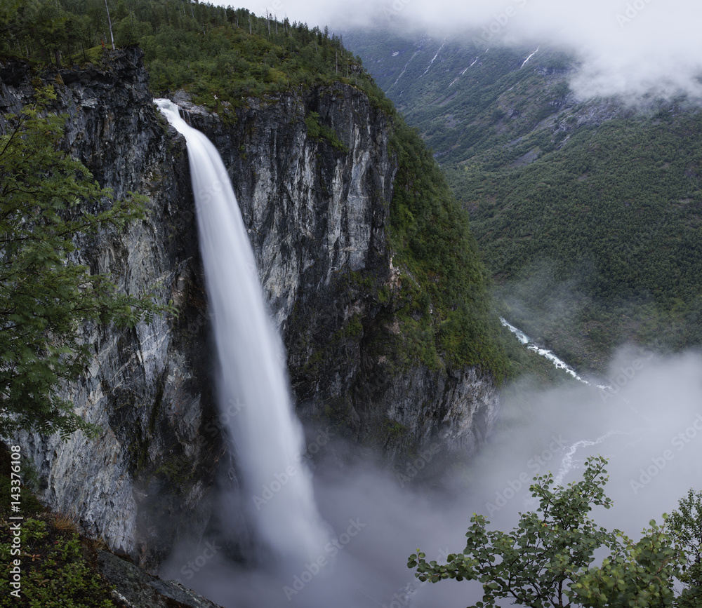 Norway, Jotunheimen mountain range and Utladalen valley with Vettisfossen waterfall Norway, Jotunheimen mountain range and Utladalen valley with Vettisfossen waterfall