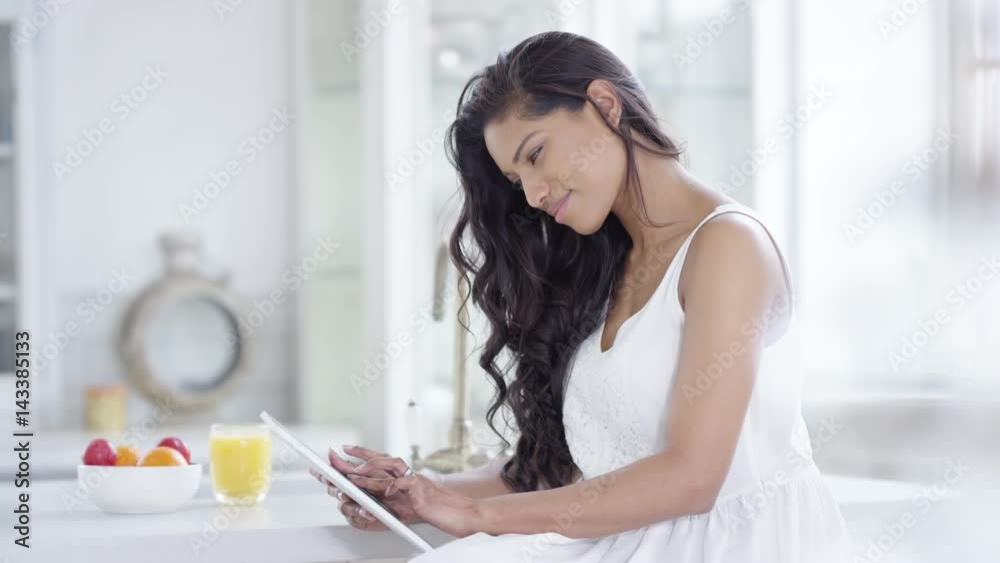 Portrait beautiful smiling woman relaxing at home with computer tablet Portrait beautiful smiling woman relaxing at home with computer tablet