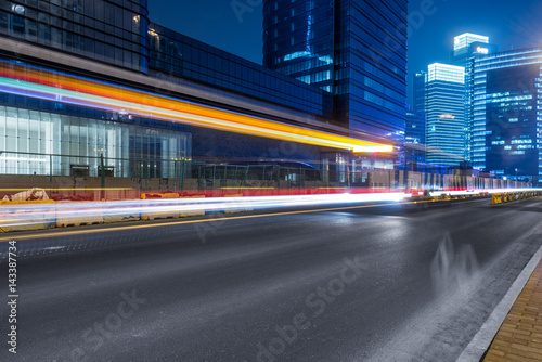 urban traffic road with cityscape at night in modern city of China.