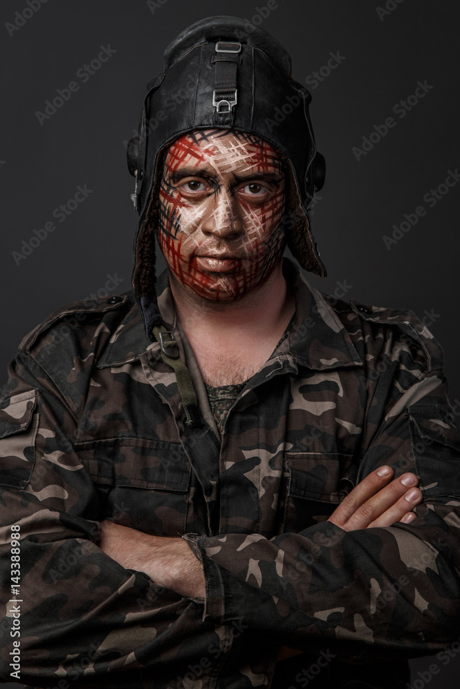 Creative and Funny Military Style Camouflage on Tankman Face Creative and Funny Military Style Camouflage on Tankman Face