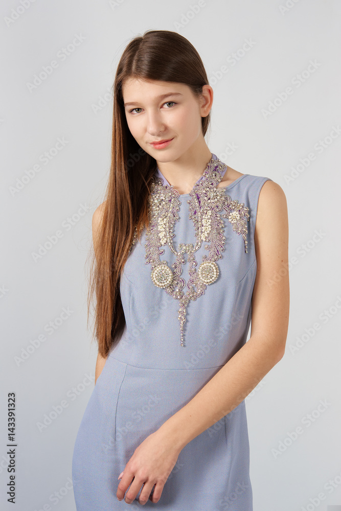Attractive fashion model in casual dress, office style. Attractive fashion model in casual dress, office style.
