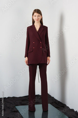Εκτύπωση καμβά Attractive fashion model in pantsuit with lacing on back
