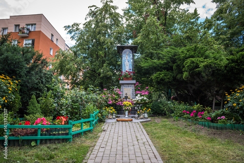 Small Virgin Mary statue in Warsaw, Poland