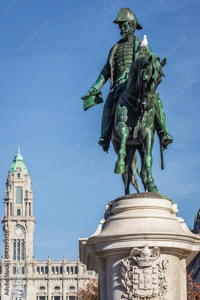 Fototapeta premium Statue of King Peter IV on Liberdade Square in Porto, Portugal. City Hall on background