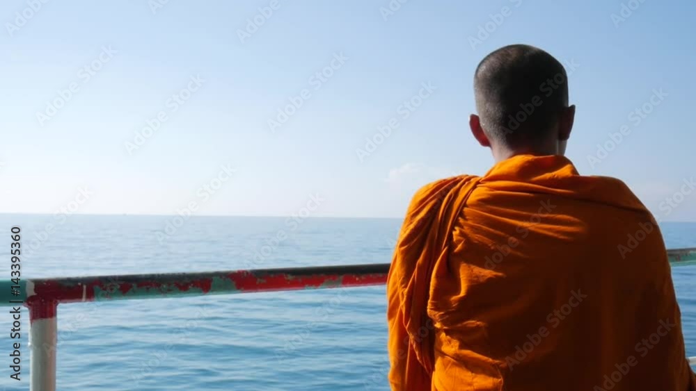 Meditating Buddhist Monk at Ferry Ship to Koh Phangan, Thailand. HD Slowmotion. Meditating Buddhist Monk at Ferry Ship to Koh Phangan, Thailand. HD Slowmotion.