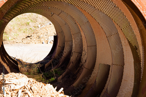 Fotografie Industrial woodchip sifter on the ground