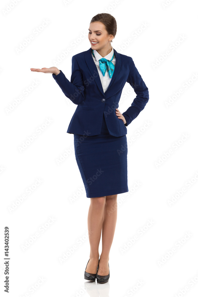 Smiling Stewardess Presenting And Watching Smiling Stewardess Presenting And Watching