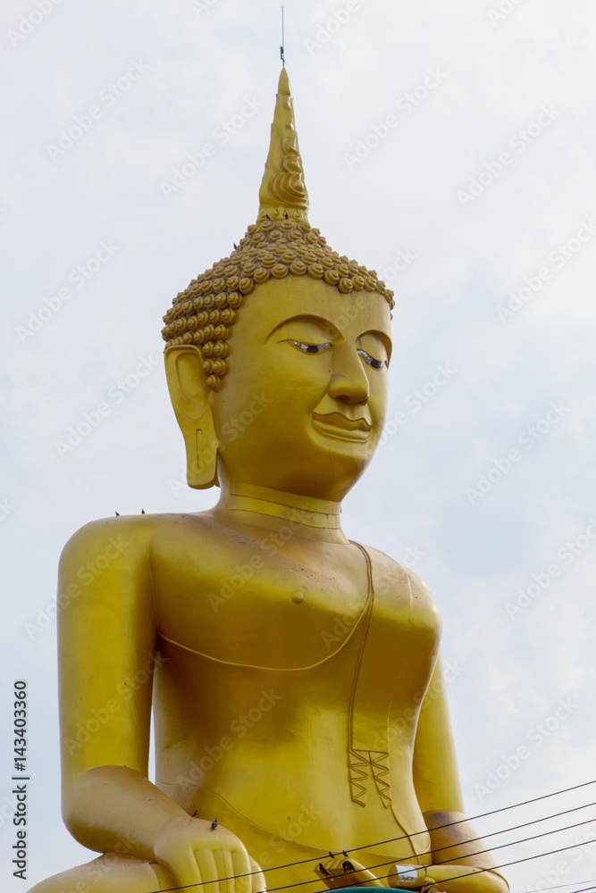 Big golden buddha Stucco at Wat Klong reua. Phitsanulok, Thailand.