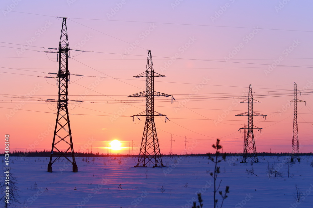 High-voltage electric wire at sunset