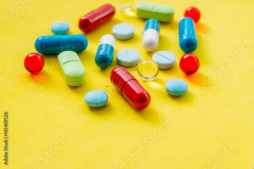  Pills in strips. Background of different tablets. Many different colorful medication and pills 