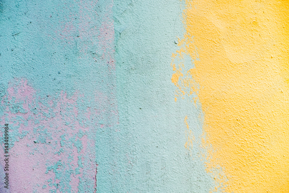 Colorful peeling old painted wall, bright colors