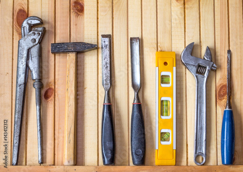 Working tools on wooden rustic background