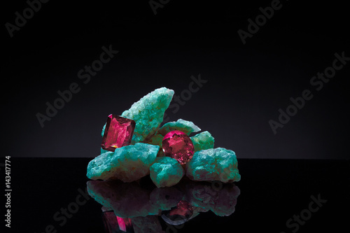 Opal with ruby gemstones